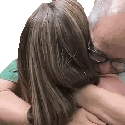 Man with Glasses Hugging Woman