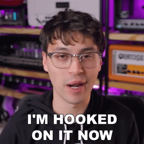 Man With Glasses In Black Hoodie Says I'm Hooked GIF
