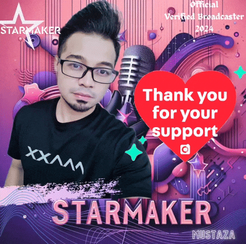 Man with Glasses in Black Starmaker Shirt