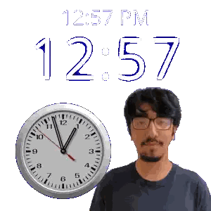 Man with Glasses in Front of 12:57 Clock