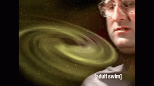 Man With Glasses in Front of Green Adult Swim Swirl