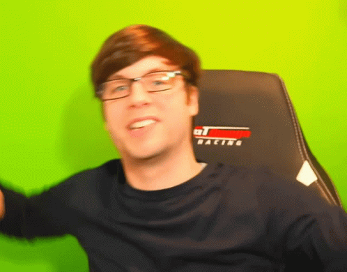 Man With Glasses in Racing Chair