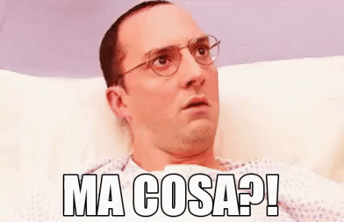 Man With Glasses Laying in Hospital Bed Ma Cosa