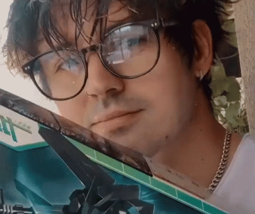 Man With Glasses Looking Out Car Window GIF