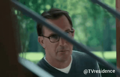 Man With Glasses Looking Through Window #tvresidence