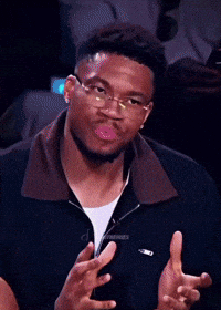 Man With Glasses Making Funny Face With Hands