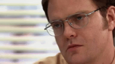 Man With Glasses Making Serious Face