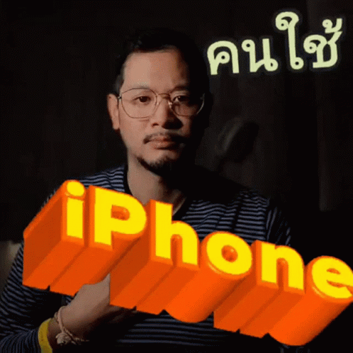 Man with Glasses Near iPhone Sign