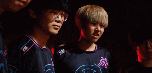 Man With Glasses Next to Man With NBS Shirt
