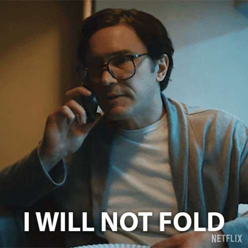 Man With Glasses On Phone Saying I Will Not Fold GIF
