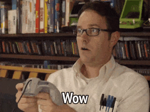 Man With Glasses Playing Game Says Wow
