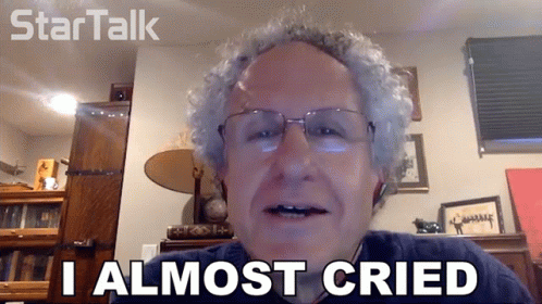 Man With Glasses Saying I Almost Cried Startalk Logo