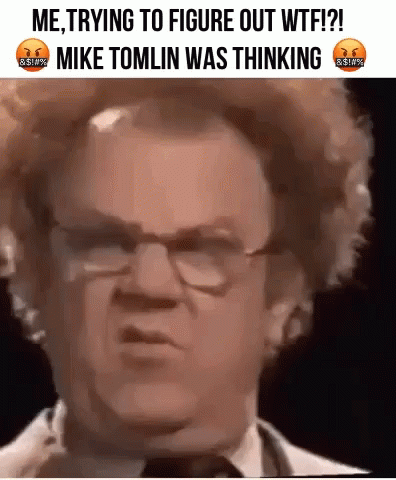 Man With Glasses Saying Me Trying to Figure Out WTF