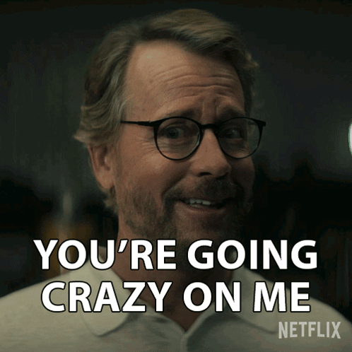 Man with Glasses Saying You're Going Crazy