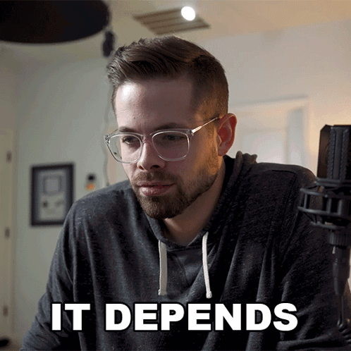 Man With Glasses Says It Depends