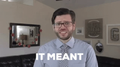 Man With Glasses Says It Meant In Front Of Couch GIF