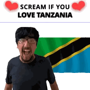 Man With Glasses Screaming in Front of Tanzanian Flag