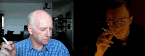 Man With Glasses Smoking Cigarette GIF
