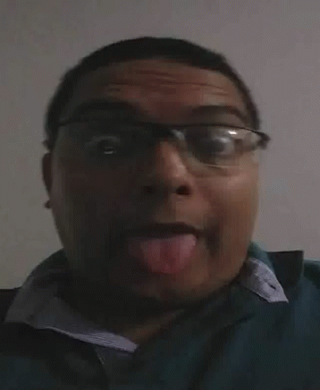 Man With Glasses Sticking Tongue Out