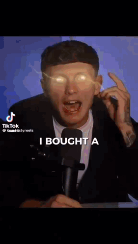 Man With Glowing Eyes At Microphone Saying Property In Egypt GIF