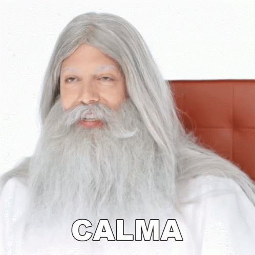 Man With Gray Beard and Mustache Saying Calma