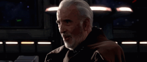 Man with Gray Hair and Beard in Brown Cloak