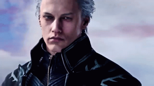 Man With Gray Hair and Black Jacket With Stars