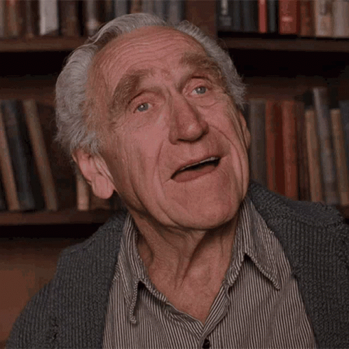 Man With Gray Hair Making Funny Face GIF