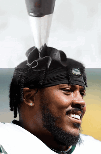 Man With Green Bay Packers Headband GIF