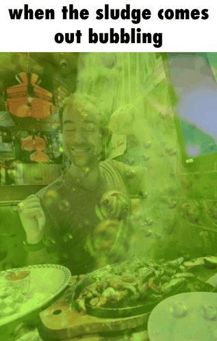 Man With Green Bubbles Coming Out of Mouth When the Sludge Comes Out Bubbling