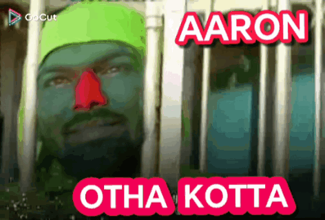 Man with Green Face Paint and Aaron