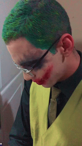 Man With Green Hair and Red Lipstick as Joker