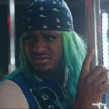 Man With Green Hair Bandana Blue Shirt Letter P
