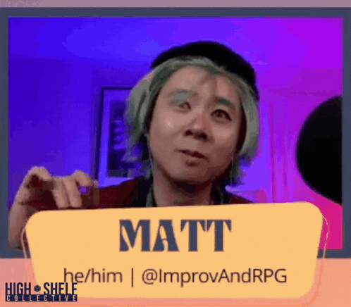 Man With Green Hair Holding Matt Sign GIF