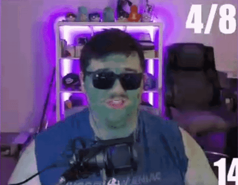 Man with Green Mask Sunglasses and Microphone