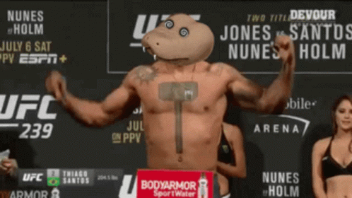 Man With Hammer on Chest UFC 239 Sign
