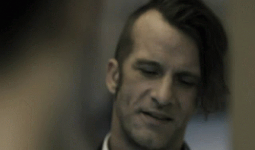 Man With Hand On Head Close Up GIF