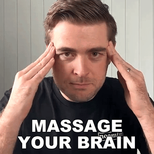 Man With Hands on Forehead Saying Massage Your Brain