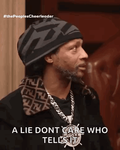 Man With Hat and Chain Says a Lie Dont Care Who Tells It