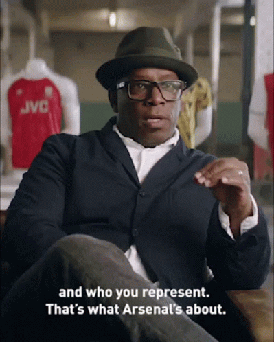 Man With Hat and Glasses Talking Arsenal
