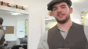 Man With Hat And Vest GIF