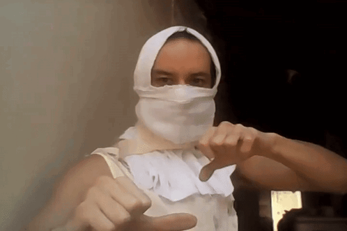 Man With Head Bandage Thumbs Down