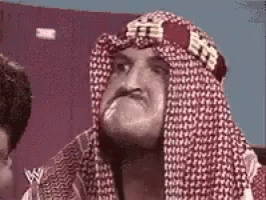 Man With Head Scarf Making Face