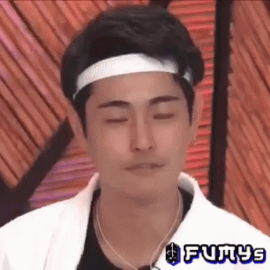 Man With Headband Making Funny Face Eyes Closed GIF