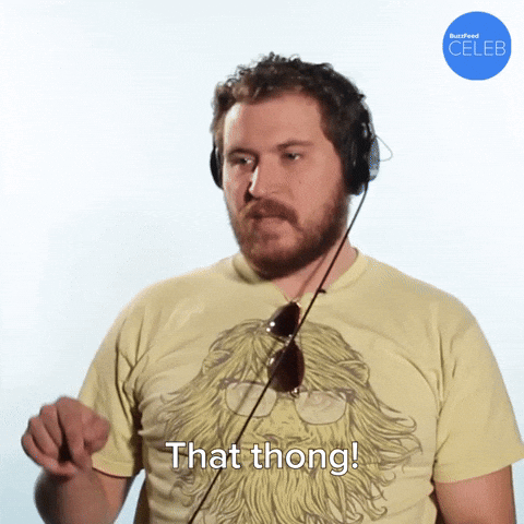 Man With Headphone Points That Thong GIF