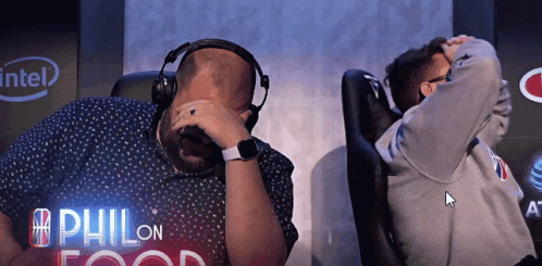 Man With Headphones And Another Man Beside Intel Logo GIF