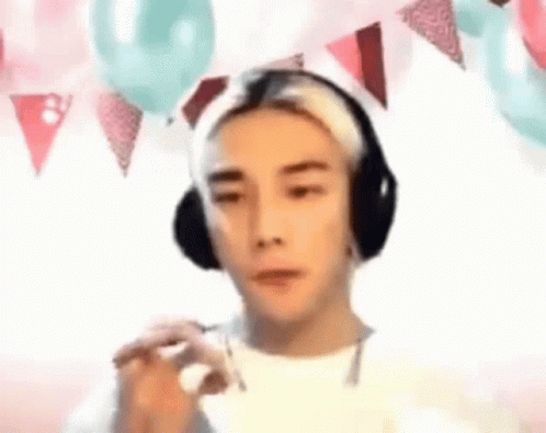 Man With Headphones and Balloons