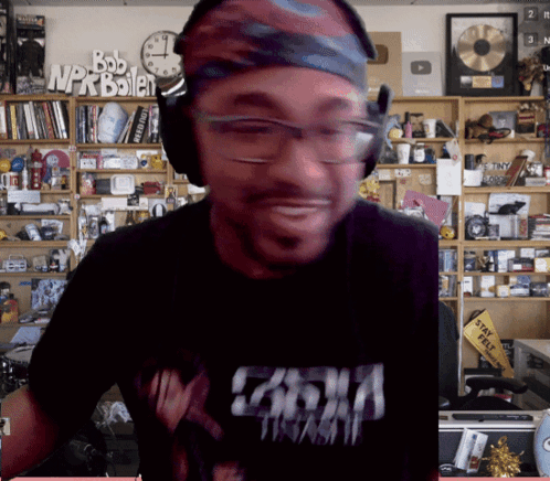 Man With Headphones And Bandana Shirt Says Casha GIF