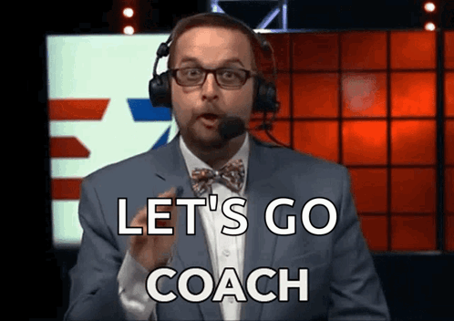 Man With Headphones and Bow Tie Says Let's Go Coach