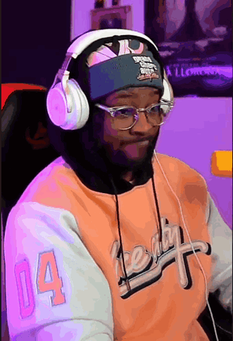 Man With Headphones And Glasses And Number 14 Shirt GIF